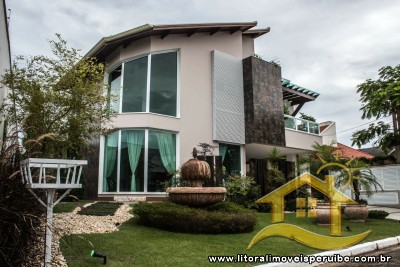 Casa - Assobradada com 5 dormitórios (sendo 5 suite(s)) a 0,00 metros praia.