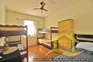 Casa - Térrea com 2 dormitórios (sendo 1 suite(s)) a 50,00 metros praia.