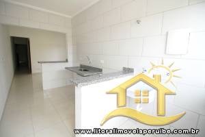 Casa - Térrea com 2 dormitórios (sendo 1 suite(s)) a 2,00 metros praia.