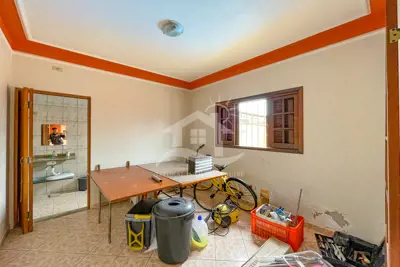 Casa - Térrea com piscina com 3 quartos (sendo 1 suite(s)) a 500,00 metros praia.