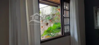 Casa - Sobrado com 4 dormitórios (sendo 1 suite(s)) a 800,00 metros praia.