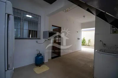 Casa - Térrea com piscina com 3 dormitórios (sendo 2 suite(s)) a 450,00 metros praia.