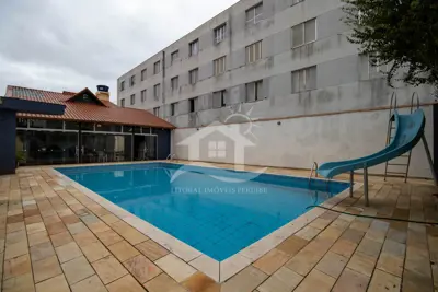 Casa - Térrea com piscina com 3 dormitórios (sendo 2 suite(s)) a 450,00 metros praia.