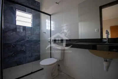 Casa - Térrea com piscina com 2 dormitórios (sendo 1 suite(s)) a 2700,00 metros praia.