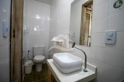 Casa - Térrea com piscina com 3 dormitórios (sendo 2 suite(s)) a 100,00 metros praia.