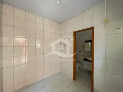 Casa - Térrea com Edícula com 3 dormitórios (sendo 2 suite(s)) a 500,00 metros praia.