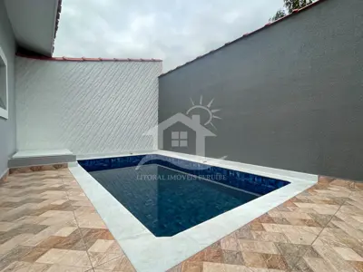 Casa - Térrea com 2 dormitórios (sendo 1 suite(s)) a 900,00 metros praia.