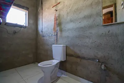 Casa - Térrea com 2 dormitórios (sendo 1 suite(s)) a 1,90 metros praia.