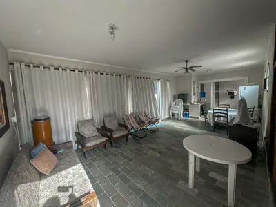 Casa - Térrea com piscina com 3 quartos (sendo 1 suite(s)) a 550,00 metros praia.