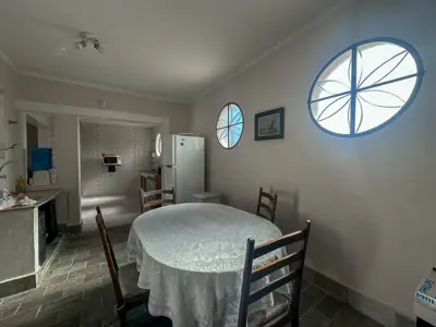 Casa - Térrea com piscina com 3 quartos (sendo 1 suite(s)) a 550,00 metros praia.