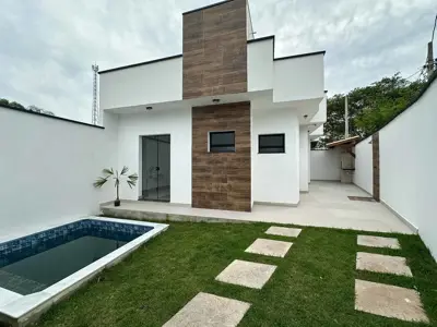 Casa - Térrea com 2 quartos (sendo 1 suite(s)) a 1200,00 metros praia.