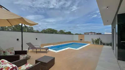 Casa - Térrea com piscina com 3 quartos (sendo 3 suite(s)) a 3000,00 metros praia.