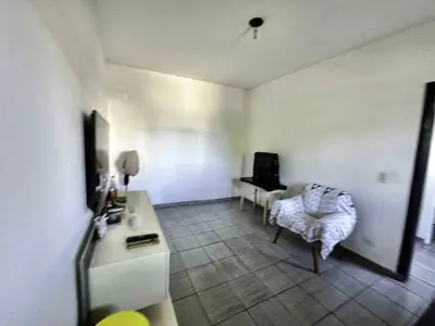 Comercial - Salão comercial + Edícula assobradada com  quartos  a 500,00 metros praia.