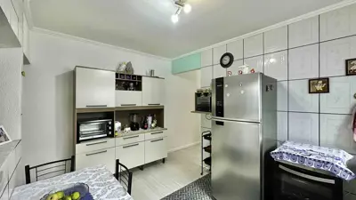Casa - Térrea com Edícula com 2 quartos (sendo 1 suite(s)) a 700,00 metros praia.