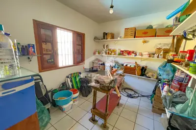 Casa - Térrea com Edícula com 3 dormitórios (sendo 1 suite(s)) a 600,00 metros praia.