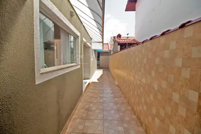 Casa - Sobrado com 4 dormitórios (sendo 2 suite(s)) a 100,00 metros praia.