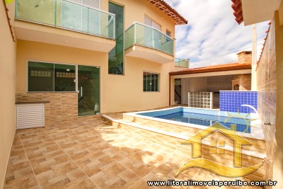 Casa - Assobradada com 2 dormitórios (sendo 2 suite(s)) a 600,00 metros praia.