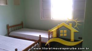 Casa - Térrea com 2 dormitórios (sendo 1 suite(s)) a 700,00 metros praia.