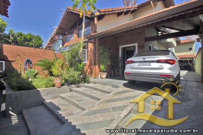 Casa - Térrea com 5 dormitórios (sendo 2 suite(s)) a 500,00 metros praia.