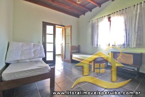 Casa - Térrea com 5 dormitórios (sendo 2 suite(s)) a 500,00 metros praia.