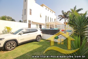 Casa - Sobrado com 3 dormitórios (sendo 3 suite(s)) a 30,00 metros praia.