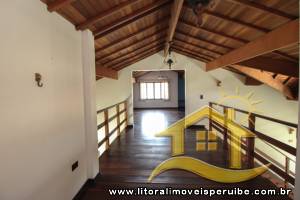 Casa - Térrea com piscina com 5 dormitórios (sendo 3 suite(s)) a 300,00 metros praia.