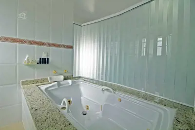 Casa - Térrea com 3 dormitórios (sendo 3 suite(s)) a 1500,00 metros praia.