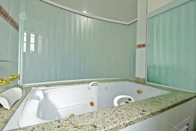 Casa - Térrea com 3 dormitórios (sendo 3 suite(s)) a 1500,00 metros praia.