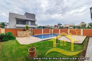 Casa para  no bairro Bougainvillée I, em Peruíbe / São Paulo.