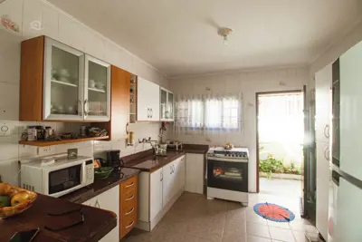 Casa - Térrea com Edícula com 3 dormitórios (sendo 1 suite(s)) a 600,00 metros praia.