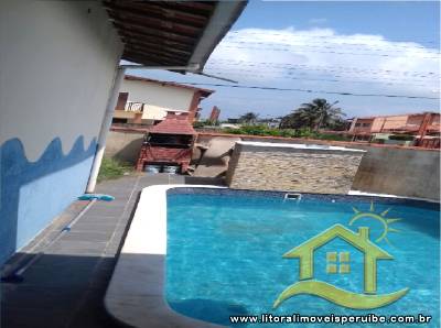 Casa - Térrea com piscina com 4 dormitórios (sendo 1 suite(s)) a 200,00 metros praia.