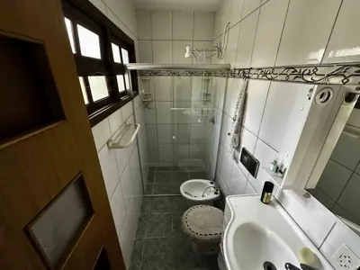 Casa - Térrea com 3 quartos (sendo 1 suite(s)) a 1000,00 metros praia.