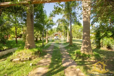 Casa - Térrea com 3 dormitórios (sendo 3 suite(s)) a 0,00 metros praia.