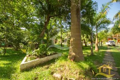 Casa - Térrea com 3 dormitórios (sendo 3 suite(s)) a 0,00 metros praia.