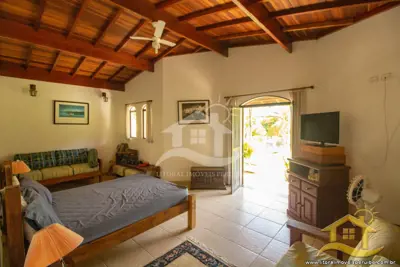 Casa - Térrea com 3 dormitórios (sendo 3 suite(s)) a 0,00 metros praia.