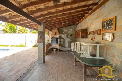 Casa - Térrea com 3 dormitórios (sendo 3 suite(s)) a 0,00 metros praia.