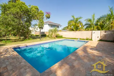 Casa - Térrea com 3 dormitórios (sendo 3 suite(s)) a 0,00 metros praia.
