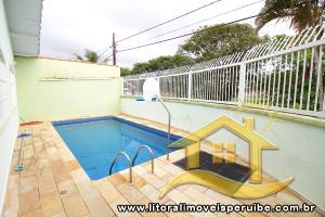 Casa - Térrea com 3 dormitórios (sendo 1 suite(s)) a 800,00 metros praia.