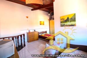 Casa - Térrea com piscina com 3 quartos (sendo 1 suite(s)) a 200,00 metros praia.