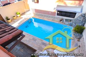Casa - Térrea com piscina com 3 quartos (sendo 1 suite(s)) a 200,00 metros praia.