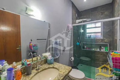 Casa - com Mezanino com 3 dormitórios (sendo 1 suite(s)) a 1,00 metros praia.