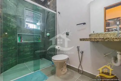 Casa - com Mezanino com 3 dormitórios (sendo 1 suite(s)) a 1,00 metros praia.