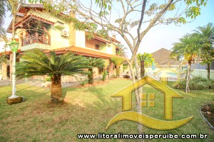 Casa - Assobradada com 5 dormitórios (sendo 2 suite(s)) a 7,00 metros praia.