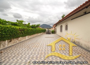 Casa - Térrea com 3 dormitórios (sendo 1 suite(s)) a 600,00 metros praia.