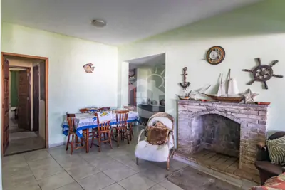 Casa - Térrea com 2 dormitórios (sendo 2 suite(s)) a 0,00 metros praia.