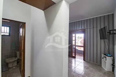 Casa - Sobrado com 4 dormitórios (sendo 4 suite(s)) a 600,00 metros praia.