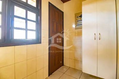 Casa - Sobrado com 4 dormitórios (sendo 2 suite(s)) a 500,00 metros praia.